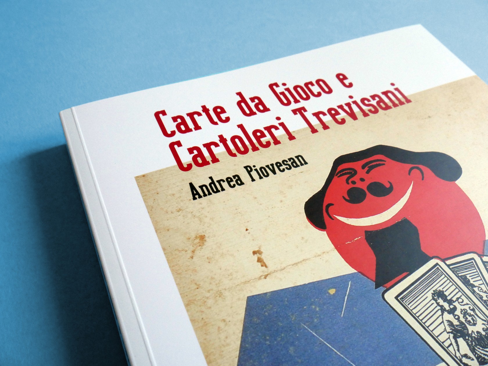 Carte da Gioco e Cartoleri Trevisani, progetto editoriale per Antiga Edizioni dettaglio Dettaglio della copertina del progetto editoriale Carte da Gioco e Cartoleri Trevisani